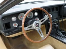 VetteAid analog dash package with Autometer gauges. Clasic wood steering wheel.