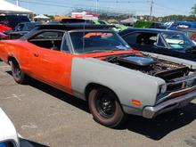 1969-1/2 A12 Super Bee.  Unrestored, all original paperwork, in contact with the original owner, 4spd, bucket seats, tach, console, V2 Hemi Orange, black top/interior/stripe