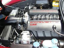 Engine compartment with carbon fiber parts from American Hydrocarbon