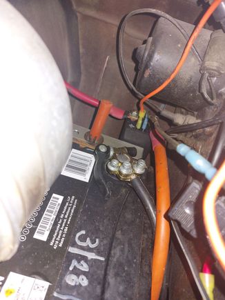 Remote solenoid on positive post of the battery.