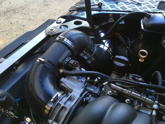 ...goes into the throttle body side of the MAF.