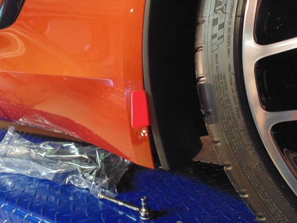 Pry out the old splash guard. (Right front)