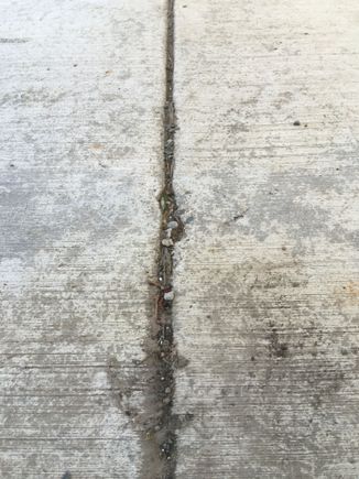 This is a joint cut in with a tool while the cement was being poured outside the shop.
These suck for rolling things