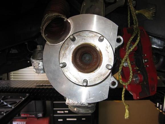 LG Spindle Duct Backing Plate Before Adaptation.  Note lack of clearance for caliper ears at the bolt holes.