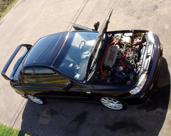 2.5 RS-STI Swap This engine was never sold in the United States. It is an 8250RPM Redline Japanese EJ207; 2Litre Turbocharged Flat 4. Mods are to many to list... All internals are forged and balanced, the crank is nitrided, the pistons, exhaust headers, turbocharger turbine, up pipe, downpipe are all ceramic coated, all ports are gasket ported and gasket matched, etc..