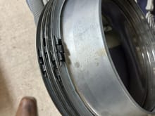 This one came off a 70's Camaro as I understand it. seems like the older ones had about 6 or 8 of those clips spread equally around the hubcap.