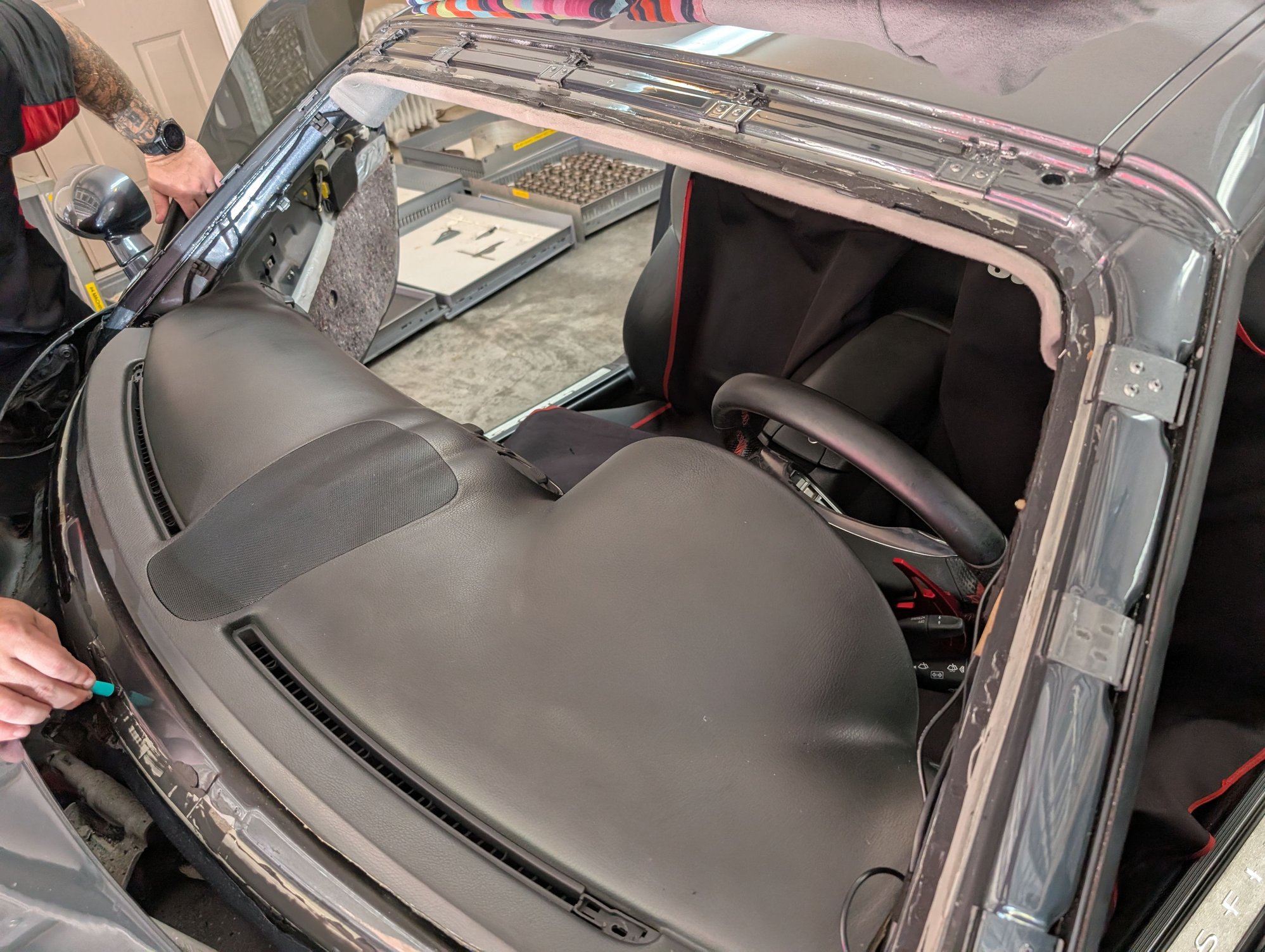 Absolutely zero rust under the windshield or adhesive.  Benefits of a southwest car!
