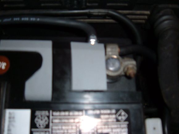 Trimmed the grey cover allowing cable terminal to protrude without losing the cap.