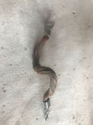 Factory raw copper cable at bellhousing to frame, driver's side.