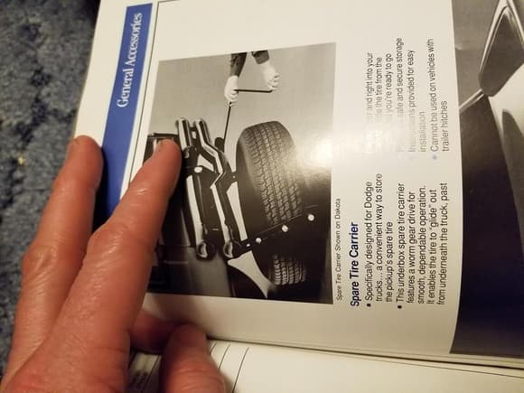 Here is one I have never seen. Its a Mopar accessory spare tire unit that you don't have to lay on your back to lower or install your spare tire. Anyone ever see this one?