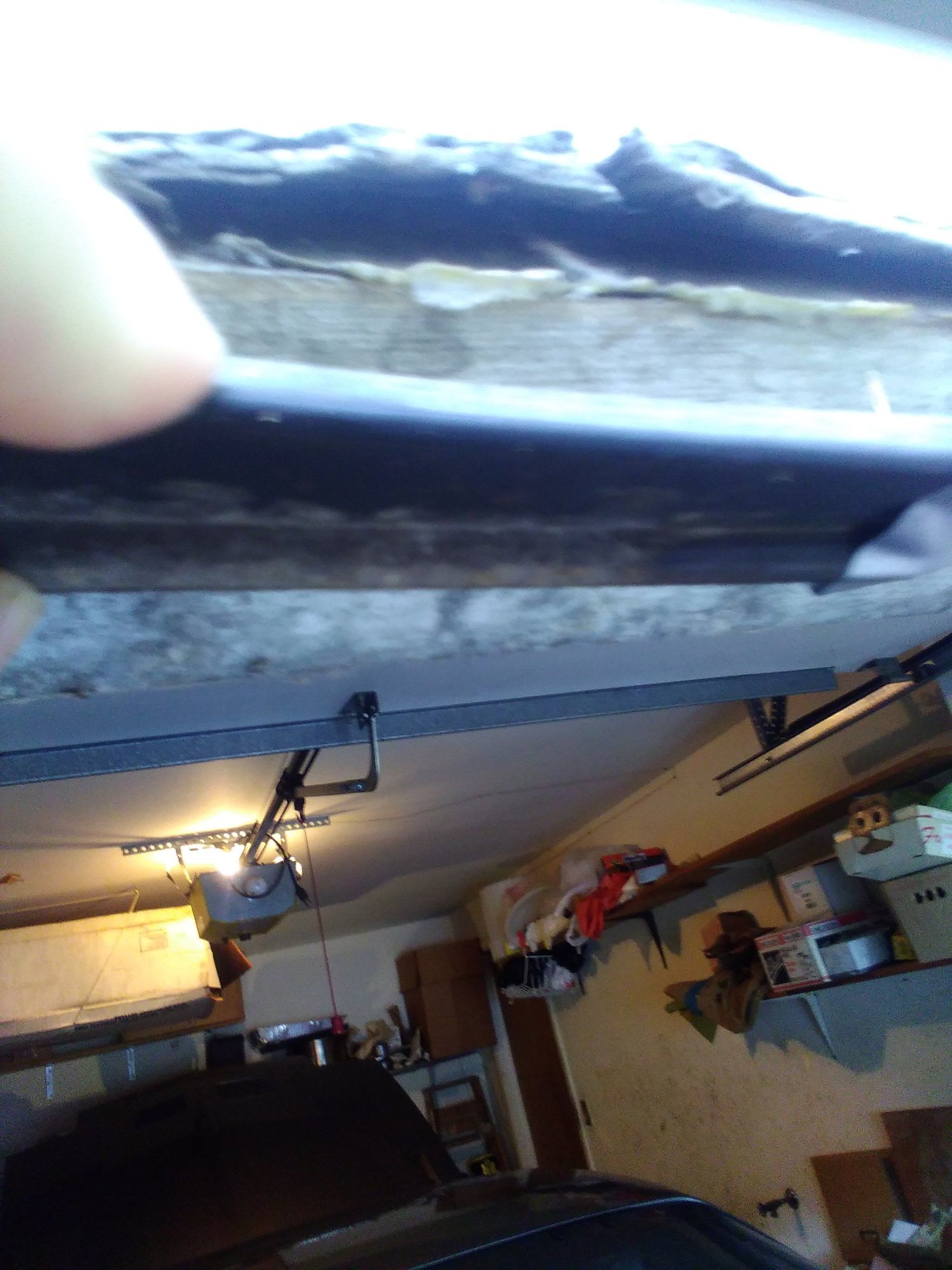 Veneer on Garage Door Panel Cracking. How to Fix ?