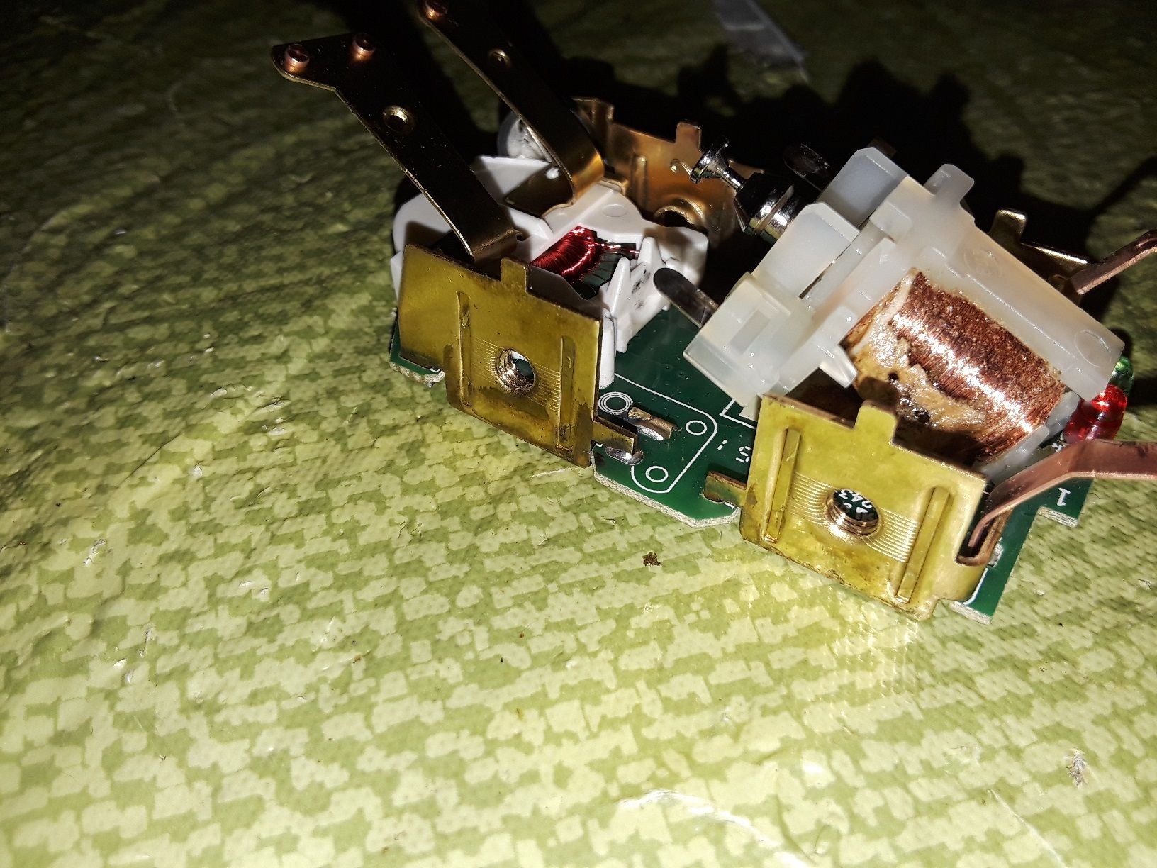 What could cause a GFCI to fail this way? Pictures included