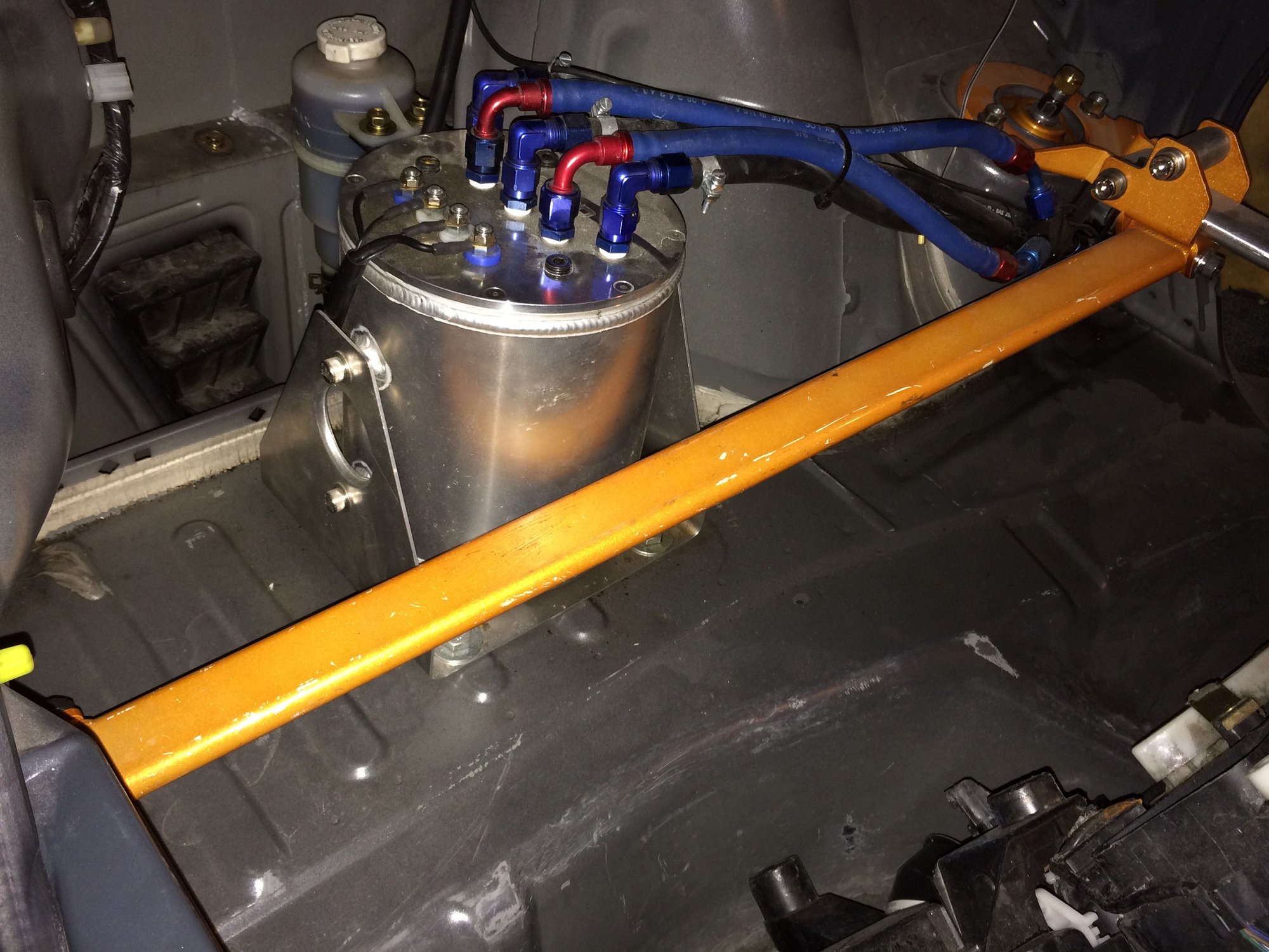 Huge surge tank in the boot 