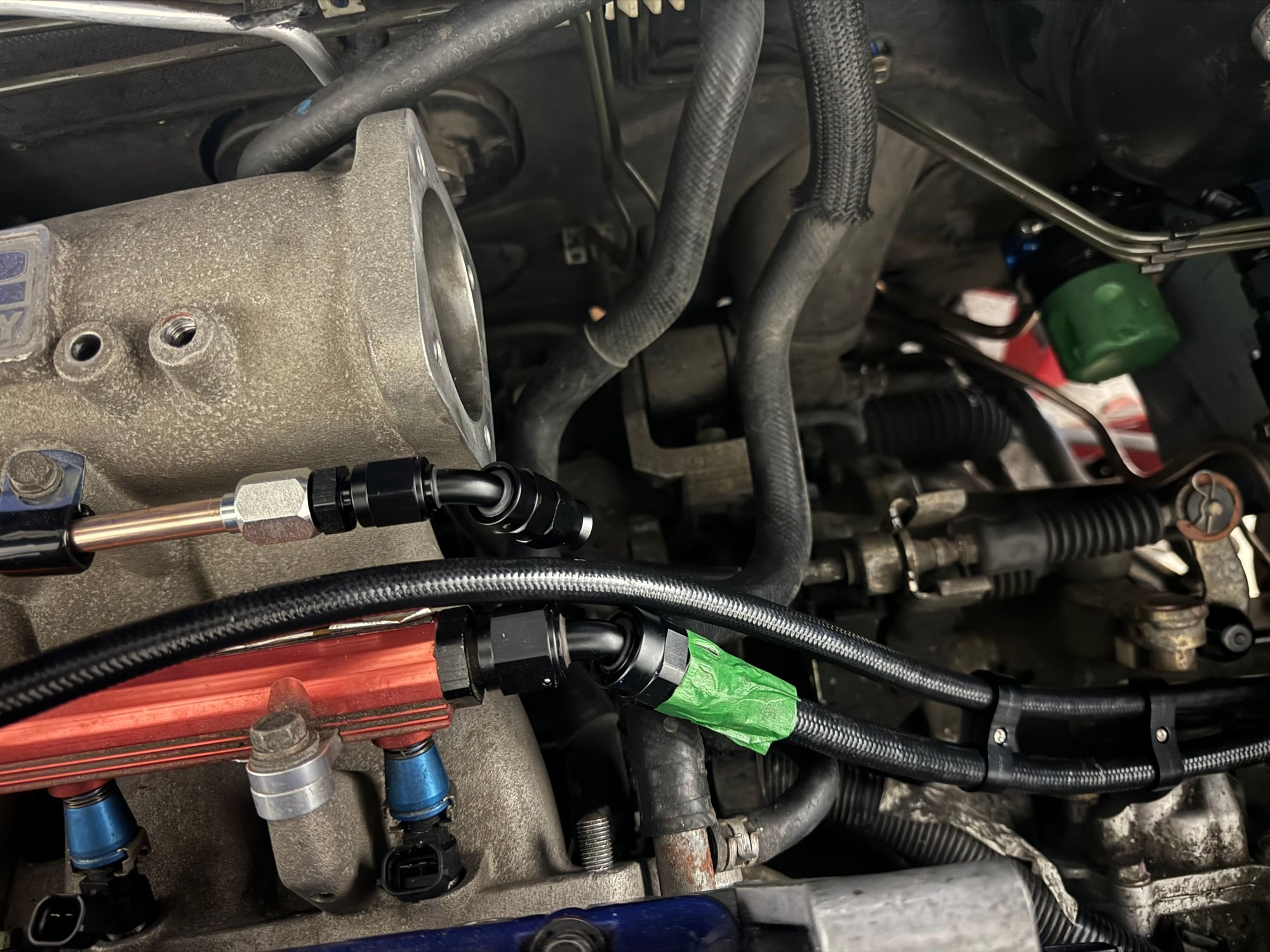 PTFE hoses to the rail/intake manifold with the return line not cut yet