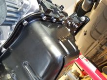 Secured the oil pan following the RTV instruction on the tube.  I used STM's oil pan allen bolts for a clean look.  My old oil pan bolts look like crap.