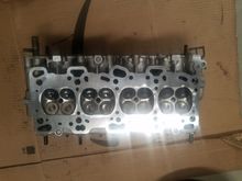 Resurfaced cylinder head.  This is after I also cleaned the hell out of the valve heads.  They were covered with carbon and burnt oil even after hot tank.