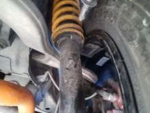 Rear was hitting because the wheel was pivoted a bit, due to the front of the wheel hitting the OEM trailing arm. Luckily, this went away. 