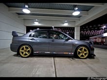 Old photo of my car, with a gold set.