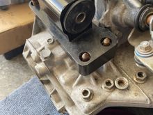 am I missing some hardware/special fasteners? even on the opposite side it barely begins to thread the OEM nuts.