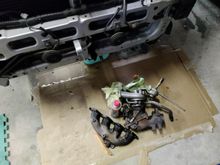 Tiny o2 housing on the stock turbo!