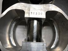 Each piston is marked which position it was in. The number is a batch number, not a part number.