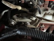 Left bolt securing fuel rail