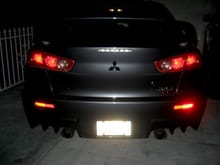 Night lights with camera flash - gorgeous set of aggressive tail lights and reflectors. Angry trunk mouth that finishes off the rear angry face &lt;3