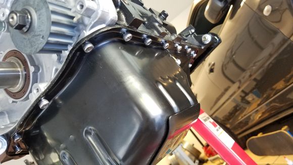 Secured the oil pan following the RTV instruction on the tube.  I used STM's oil pan allen bolts for a clean look.  My old oil pan bolts look like crap.
