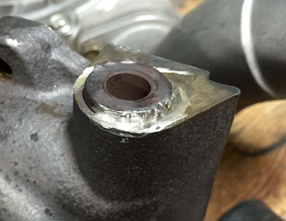 Tried grinding the bushing welds away by hand which was a mistake. Mostly a mistake because I'm not sure one should even try to remove it.