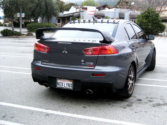 There's a fair share of Evo people that hate how the X looks from the back - I would have agreed too, that is, until you slap a big Vortex Generator and mudflaps on. I've received so many compliments on how cool Nox looks from behind, from friends to other drivers on the road that pull up along side before even seeing the front of the car. Even got a yell from a guy walking on the sidewalk in the same direction of traffic, when I was stopped at a light, saying the car looked awesome. Of course, the front gets plenty of unargumented attention without any bling XD