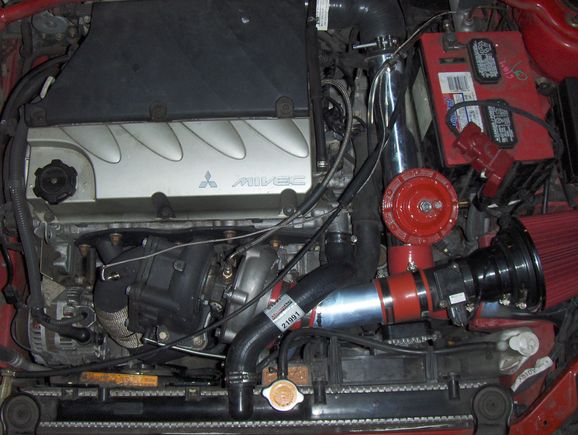 finished proect- battery re-located, intake ran, intercooler pipes installed.... its like putting together a puzzle!!!