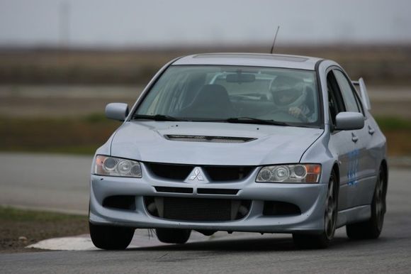 Rear tires off the ground. More rear bar wouldn't help here.