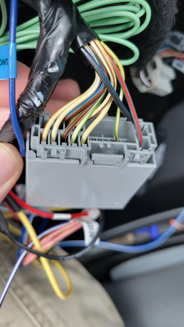 From the back of the ford harn. No connection to the Crux on that small yellow/green wire.