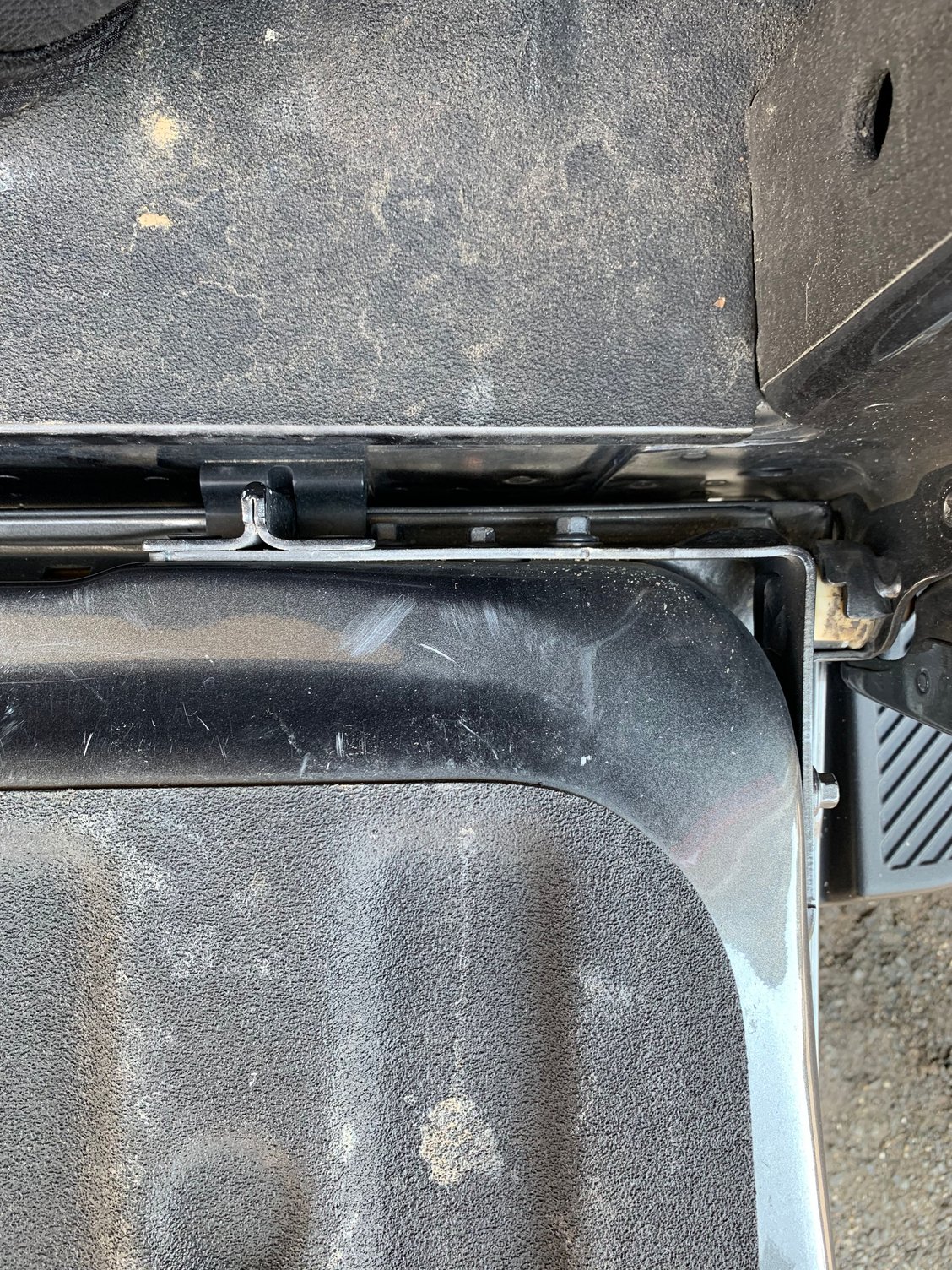 Brackets on the right side of the tailgate. Ford F150 Forum