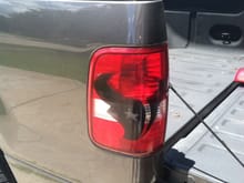 tail lights blacked out with texans logo