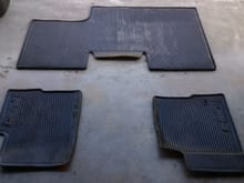Ford OEM all weather mats.  Driver mat has some wear