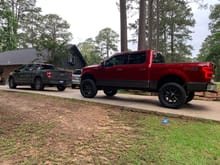 Tried to snag a pic, albeit a bad one, of the buddy's new STX, he just got it leveled and put my old Ridge Grapplers on it.