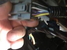 cable from inside the lower part of the center console after I removed the tray