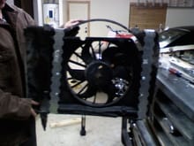 E-fan mounted in shroud with steel strapping.