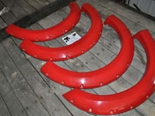 Bushwacker Fender Flares
2004-2008 Model
Painted bright red  Paint Code: E4  Professionally painted
90% of Mounting hardware included
Good condition  Few scuffs on bottom of flares from road cinders etc (expected) cant see when on the truck