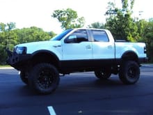 38x15.50x20 Nitto Mud Grapplers, 20 inch Fuel Hostages, 6 inch Fabtech suspension lift, 3 inch body lift, 2.5 inch leveling kit