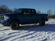 With F150lifts.com coilovers, Camburg UCAs and add-a-leaf