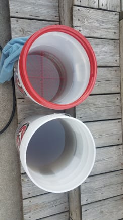 Red lipped bucket was the soapy water, the other was the rinse bucket.