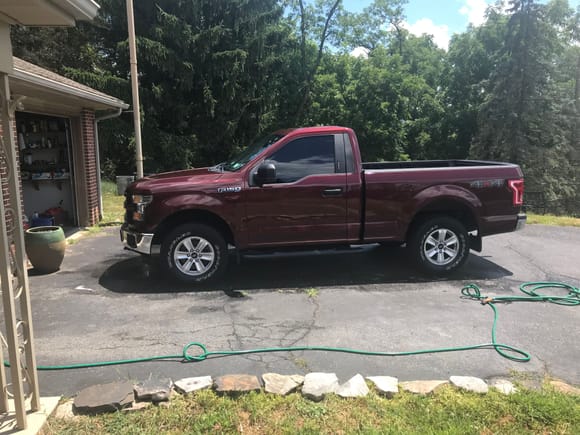 Only had it a week so 25% tint, 28” magna muffler and removed the lift blocks. Really loving this truck, 16 bronze fire. 