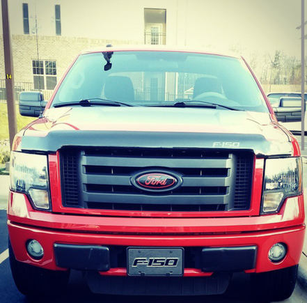 Ford badge overlay and SVT style headlights