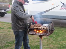 Son in law doing the grilling. Boudin...sausage and steak.