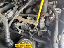 2007 F150 4.6L passenger side above the Ignition Coil
