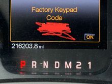 It should present you with the factory door code.