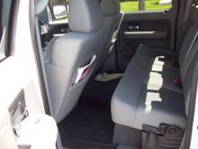 08 Ford F150just a shot of the stock interior I am going to put in a Kat skins interior shortly but you and see the box that houses my two jlw1v2 subs the box is made by subthump.com .64 a side and the jl's only need .625 it fits and looks really nice and the funtionallity of the box is great it will play rock hip hop compter bass music and oldies a little country I have been very happwith its performance  004
