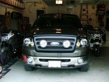 Hella Grille on Dark Stone Truck.
Lights are Ford HD lights
